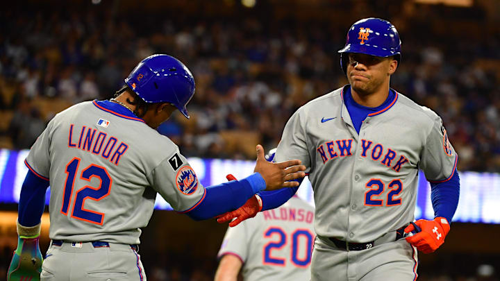 Jun 3, 2025; Los Angeles, California, USA; New York Mets outfielder Juan Soto (22) reacts with shortstop Francisco Lindor (12) after hitting a two run home run against the Los Angeles Dodgers during the third inning at Dodger Stadium. Mandatory Credit: Gary A. Vasquez-Imagn Images