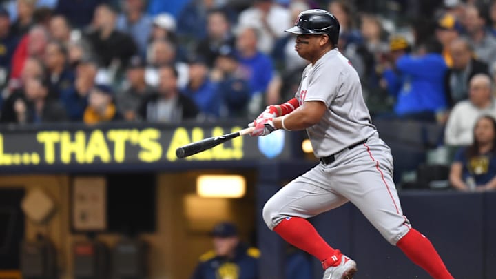 May 28, 2025; Milwaukee, Wisconsin, USA; Boston Red Sox designated hitter Rafael Devers (11) hits a two run single during the fourth inning against the Milwaukee Brewers at American Family Field. Mandatory Credit: Patrick Gorski-Imagn Images May 28, 2025; Milwaukee, Wisconsin, USA; Boston Red Sox designated hitter Rafael Devers (11) hits a two run single during the fourth inning against the Milwaukee Brewers at American Family Field. Mandatory Credit: Patrick Gorski-Imagn Images
