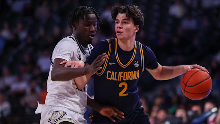 Feb 15, 2025; Atlanta, Georgia, USA; California Golden Bears guard Andrej Stojakovic (2) is defended by Georgia Tech Yellow Jackets forward Baye Ndongo (11) in the first half at McCamish Pavilion. Mandatory Credit: Brett Davis-Imagn Images
