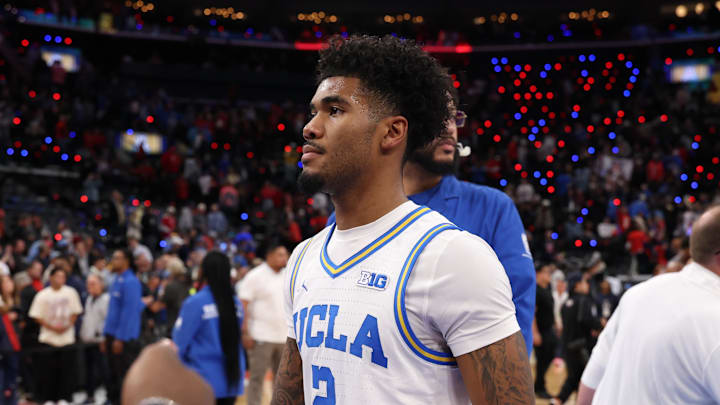 Nov 14, 2025; Inglewood, California, USA;  UCLA Bruins guard Donovan Dent (2) leaves the court after defeated by the Arizona Wildcats 69-65 at Intuit Dome. Mandatory Credit: Kiyoshi Mio-Imagn Images