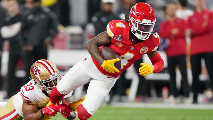 Feb 11, 2024; Paradise, Nevada, USA; San Francisco 49ers safety Logan Ryan (33) tackles Kansas City Chiefs wide receiver Rashee Rice (4) during the second quarter of Super Bowl LVIII at Allegiant Stadium. Mandatory Credit: Kirby Lee-USA TODAY Sports