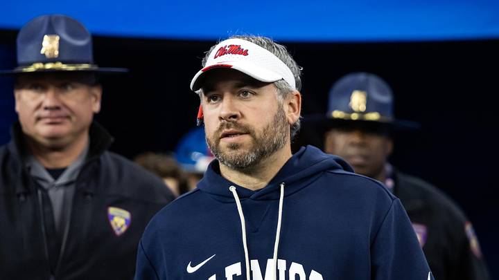 Jan 8, 2026; Glendale, AZ, USA; Mississippi Rebels head coach Pete Golding against the Miami Hurricanes during the 2026 Fiesta Bowl and semifinal game of the College Football Playoff at State Farm Stadium. Mandatory Credit: Mark J. Rebilas-Imagn Images Jan 8, 2026; Glendale, AZ, USA; Mississippi Rebels head coach Pete Golding against the Miami Hurricanes during the 2026 Fiesta Bowl and semifinal game of the College Football Playoff at State Farm Stadium. Mandatory Credit: Mark J. Rebilas-Imagn Images
