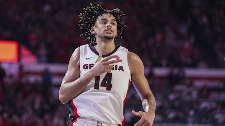 Jan 18, 2025; Athens, Georgia, USA; Georgia Bulldogs forward Asa Newell (14) reacts after making a three point shot against the Auburn Tigers at Stegeman Coliseum. Mandatory Credit: Dale Zanine-Imagn Images
