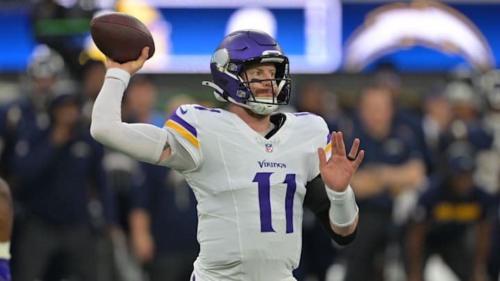 Oct 23, 2025; Inglewood, California, USA;Minnesota Vikings quarterback Carson Wentz (11) drops back to pass against the Los Angeles Chargers during the first half at SoFi Stadium. Mandatory Credit: Jayne Kamin-Oncea-Imagn Images