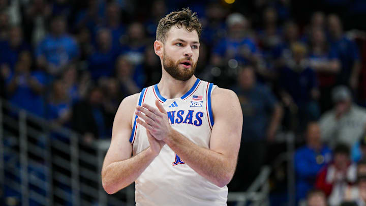 Dec 31, 2024; Lawrence, Kansas, USA; Kansas Jayhawks center Hunter Dickinson (1) reacts during the first half against the West Virginia Mountaineers at Allen Fieldhouse. Mandatory Credit: Jay Biggerstaff-Imagn Images