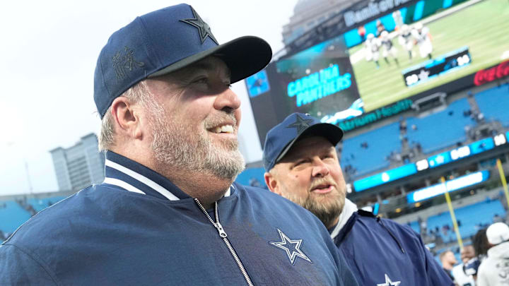 Dallas Cowboys head coach Mike McCarthy walks off the field after the game at Bank of America Stadium.