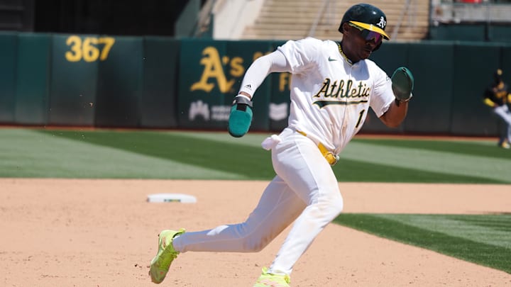 May 1, 2024; Oakland, California, USA; Oakland Athletics center fielder Esteury Ruiz (1) rounds third base for a run against the Pittsburgh Pirates during the eighth inning at Oakland-Alameda County Coliseum. Mandatory Credit: Kelley L Cox-Imagn Images