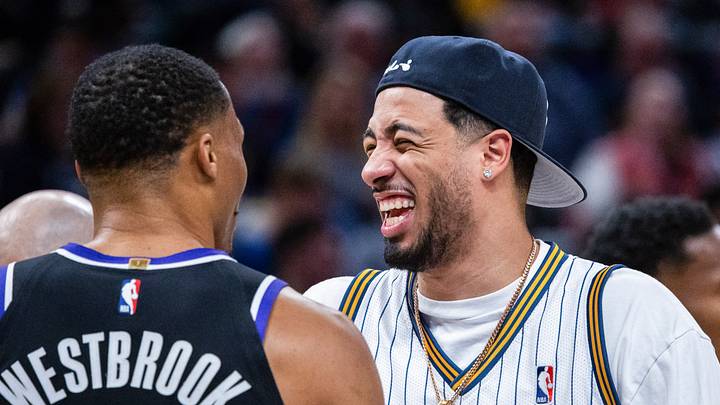 Dec 8, 2025; Indianapolis, Indiana, USA; Indiana Pacers guard Tyrese Haliburton (0) and Sacramento Kings guard Russell Westbrook (18) in the first half at Gainbridge Fieldhouse. Mandatory Credit: Trevor Ruszkowski-Imagn Images