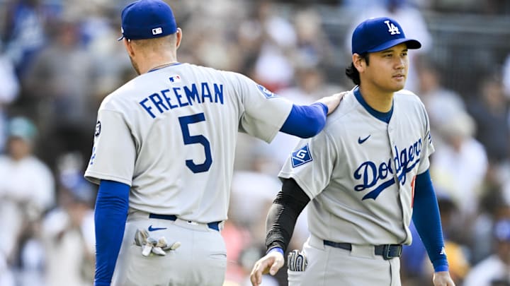 Los Angeles Dodgers first baseman Freddie Freeman (5) and Shohei Ohtani (17) celebrate after the Dodgers beat the San Diego Padres at Petco Park.