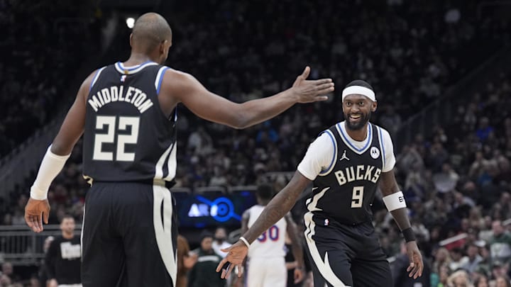 Jan 19, 2025; Milwaukee, Wisconsin, USA; Milwaukee Bucks forward Khris Middleton (22) and Milwaukee Bucks forward Bobby Portis (9) celebrate a made basket in the first half at Fiserv Forum. Mandatory Credit: Michael McLoone-Imagn Images
