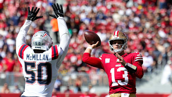 Sep 29, 2024; Santa Clara, California, USA; San Francisco 49ers quarterback Brock Purdy (13) looks to pass the ball against New England Patriots linebacker Raekwon McMillan (50) during the second quarter at Levi's Stadium. Mandatory Credit: Sergio Estrada-Imagn Images Sep 29, 2024; Santa Clara, California, USA; San Francisco 49ers quarterback Brock Purdy (13) looks to pass the ball against New England Patriots linebacker Raekwon McMillan (50) during the second quarter at Levi's Stadium. Mandatory Credit: Sergio Estrada-Imagn Images