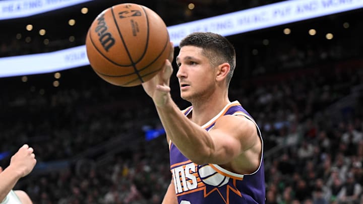 Mar 16, 2026; Boston, Massachusetts, USA; Phoenix Suns guard Grayson Allen (8) passes the ball against the Boston Celtics during the first half at the TD Garden. Mandatory Credit: Brian Fluharty-Imagn Images