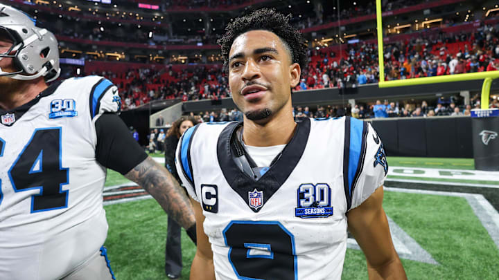 Jan 5, 2025; Atlanta, Georgia, USA; Carolina Panthers quarterback Bryce Young (9) celebrates with teammates after a victory over the Atlanta Falcons in overtime at Mercedes-Benz Stadium. Mandatory Credit: Brett Davis-Imagn Images