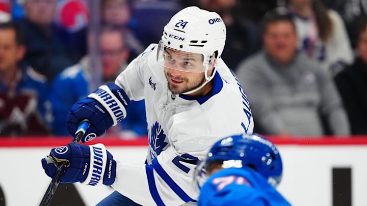 Jan 12, 2026; Denver, Colorado, USA; Toronto Maple Leafs center Scott Laughton (24) takes a shot on goal in the first period at Ball Arena. Mandatory Credit: Ron Chenoy-Imagn Images Jan 12, 2026; Denver, Colorado, USA; Toronto Maple Leafs center Scott Laughton (24) takes a shot on goal in the first period at Ball Arena. Mandatory Credit: Ron Chenoy-Imagn Images
