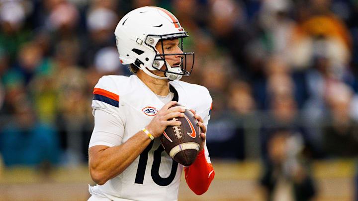 Virginia quarterback Anthony Colandrea (10) looks for an open receiver during a NCAA college football game against Notre Dame 