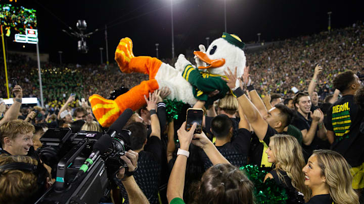 The Oregon Ducks surfs the crowd after the football team defeated Ohio State at Autzen Stadium Saturday, Oct. 12, 2024.