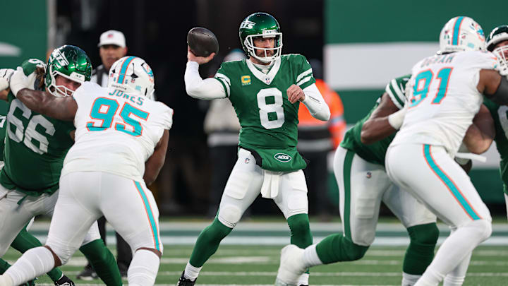 Jan 5, 2025; East Rutherford, New Jersey, USA; New York Jets quarterback Aaron Rodgers (8) throws a pass during the first quarter against the Miami Dolphins at MetLife Stadium. Mandatory Credit: Vincent Carchietta-Imagn Images