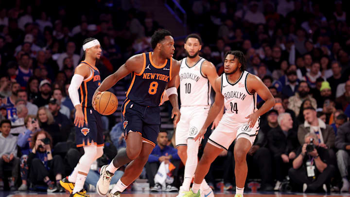 Nov 15, 2024; New York, New York, USA; New York Knicks forward OG Anunoby (8) controls the ball against Brooklyn Nets guards Ben Simmons (10) and Cam Thomas (24) during the first quarter at Madison Square Garden. Mandatory Credit: Brad Penner-Imagn Images