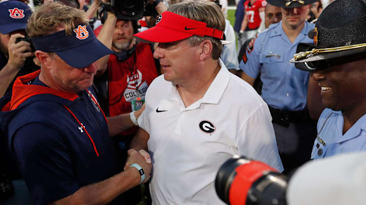 Auburn head coach Hugh Freeze and Georgia head coach Kirby Smart shake hands after a NCAA college football game in Athens, Ga., on Saturday, Oct. 5, 2024. Auburn head coach Hugh Freeze and Georgia head coach Kirby Smart shake hands after a NCAA college football game in Athens, Ga., on Saturday, Oct. 5, 2024.