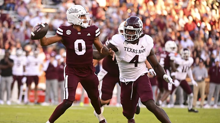 Oct 19, 2024; Starkville, Mississippi, USA;Mississippi State Bulldogs quarterback Michael Van Buren Jr. (0) drops back to pass against Texas A&M Aggies defensive lineman Shemar Stewart (4) during the third quarter at Davis Wade Stadium at Scott Field. Mandatory Credit: Matt Bush-Imagn Images Oct 19, 2024; Starkville, Mississippi, USA;Mississippi State Bulldogs quarterback Michael Van Buren Jr. (0) drops back to pass against Texas A&M Aggies defensive lineman Shemar Stewart (4) during the third quarter at Davis Wade Stadium at Scott Field. Mandatory Credit: Matt Bush-Imagn Images