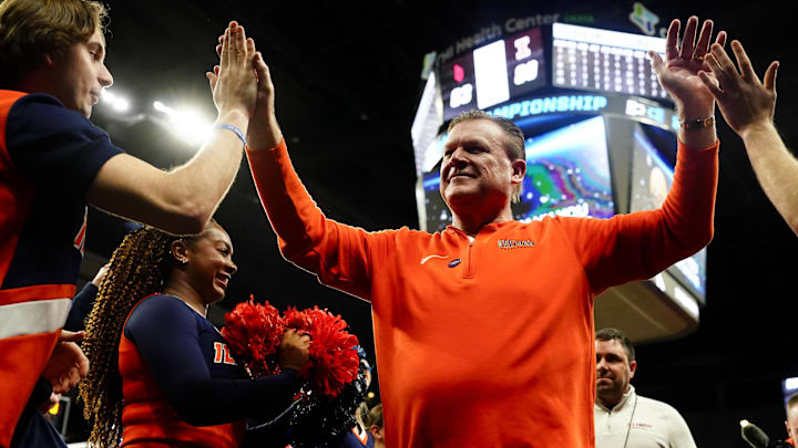 Mar 23, 2024; Omaha, NE, USA; Illinois Fighting Illini head coach Brad Underwood leaves the court after the game against the Duquesne Dukes in the second round of the 2024 NCAA Tournament at CHI Health Center Omaha. Mandatory Credit: Dylan Widger-Imagn Images