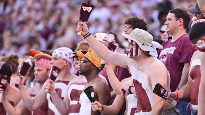 Mississippi State Bulldogs fans cheer during the first quarter of the game against the Toledo Rockets at Davis Wade Stadium at Scott Field. Mississippi State Bulldogs fans cheer during the first quarter of the game against the Toledo Rockets at Davis Wade Stadium at Scott Field.