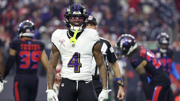 Dec 25, 2024; Houston, Texas, USA; Baltimore Ravens wide receiver Zay Flowers (4) reacts after his first down catch against the Houston Texans  in the first quarter at NRG Stadium. Mandatory Credit: Thomas Shea-Imagn Images