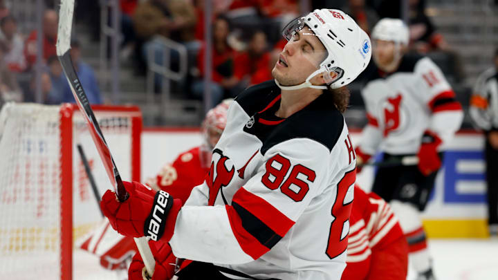 New Jersey Devils center Jack Hughes (86) reacts during the third period against the Detroit Red Wings at Little Caesars Arena. Mandatory Credit: Rick Osentoski-Imagn Images