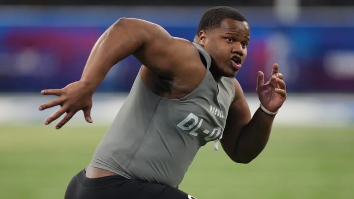 Feb 29, 2024; Indianapolis, IN, USA; Clemson defensive lineman Tyler Davis (DL03) works out during the 2024 NFL Combine at Lucas Oil Stadium. 
