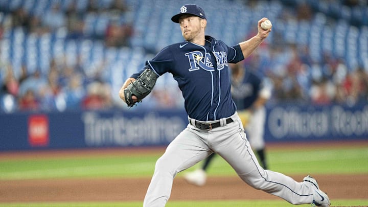 Sep 13, 2022; Toronto, Ontario, CAN; Tampa Bay Rays starting pitcher Jeffrey Springs (59) throws a pitch against the Toronto Blue Jays during the fourth inning at Rogers Centre. Mandatory Credit: Nick Turchiaro-Imagn Images