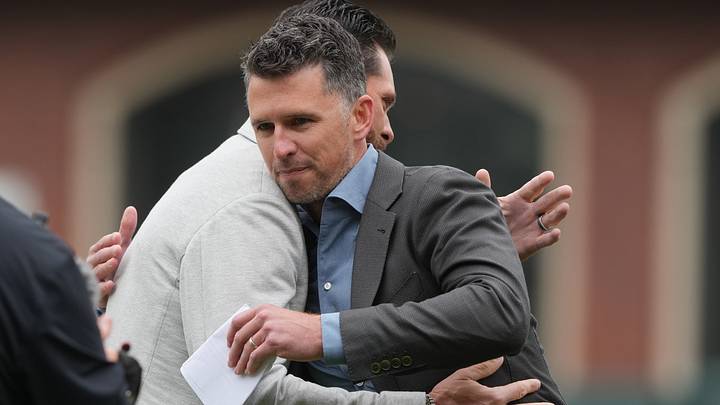 San Francisco Giants president of baseball operations Buster Posey hugs former first baseman Brandon Belt. San Francisco Giants president of baseball operations Buster Posey hugs former first baseman Brandon Belt.
