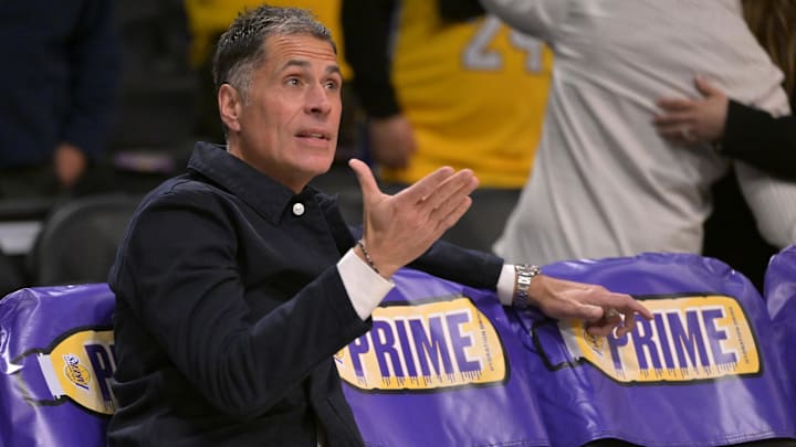 Nov 21, 2024; Los Angeles, California, USA;  Los Angeles Lakers general manager Rob Pelinka looks on as players warm up prior to the game against the Orlando Magic at Crypto.com Arena. Mandatory Credit: Jayne Kamin-Oncea-Imagn Images