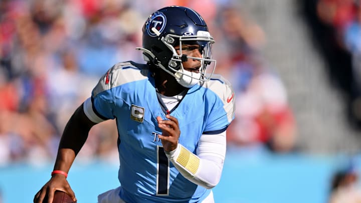 Nov 16, 2025; Nashville, Tennessee, USA; Tennessee Titans quarterback Cam Ward (1) looks to pass the ball against the Houston Texans during the first quarter at Nissan Stadium. Mandatory Credit: Steve Roberts-Imagn Images