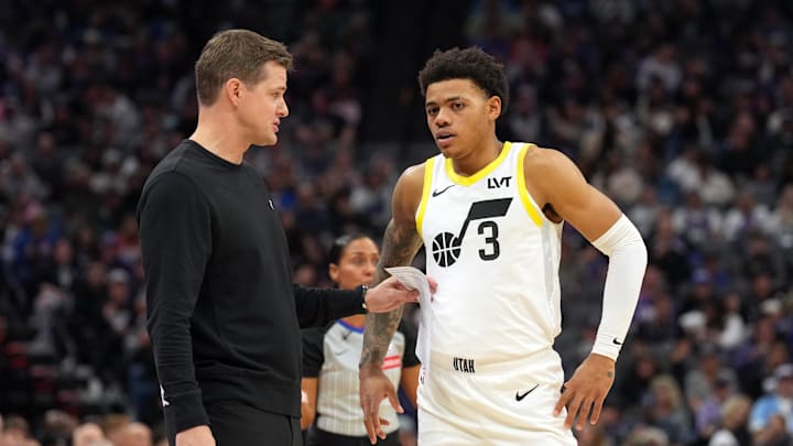 Nov 16, 2024; Sacramento, California, USA; Utah Jazz head coach Will Hardy (left) talks with guard Keyonte George (3) during the third quarter against the Sacramento Kings at Golden 1 Center. Mandatory Credit: Darren Yamashita-Imagn Images