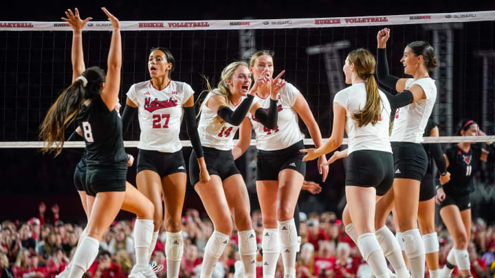 Aug 30, 2023; Lincoln, NE, USA; Nebraska Cornhuskers outside hitter Ally Batenhorst (14) celebrates with her teammates after scoring against the Omaha Mavericks during the third set at Memorial Stadium.