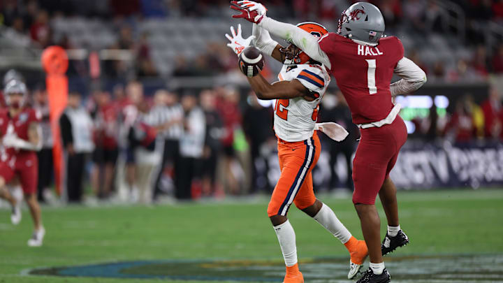 Dec 27, 2024; San Diego, CA, USA; Washington State Cougars defensive back Stephen Hall (1) deflects the ball from Syracuse Orange wide receiver Darrell Gill Jr. (82) during the first quarter at Snapdragon Stadium. Mandatory Credit: Abe Arredondo-Imagn Images Dec 27, 2024; San Diego, CA, USA; Washington State Cougars defensive back Stephen Hall (1) deflects the ball from Syracuse Orange wide receiver Darrell Gill Jr. (82) during the first quarter at Snapdragon Stadium. Mandatory Credit: Abe Arredondo-Imagn Images