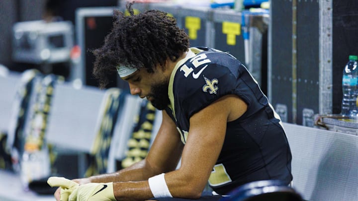 Sep 22, 2024; New Orleans, Louisiana, USA; New Orleans Saints wide receiver Chris Olave (12) reacts to a play in the final minute of the game against the Philadelphia Eagles during the second half at Caesars Superdome. Mandatory Credit: Stephen Lew-Imagn Images Sep 22, 2024; New Orleans, Louisiana, USA; New Orleans Saints wide receiver Chris Olave (12) reacts to a play in the final minute of the game against the Philadelphia Eagles during the second half at Caesars Superdome. Mandatory Credit: Stephen Lew-Imagn Images