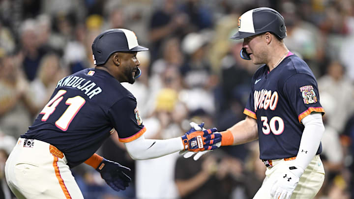 Apr 10, 2026; San Diego, California, USA; San Diego Padres left fielder Gavin Sheets (30) is congratulated by designated hitter Miguel Andujar (41) after he hit a solo home run during the fifth inning against the Colorado Rockies at Petco Park. Mandatory Credit: Denis Poroy-Imagn Images