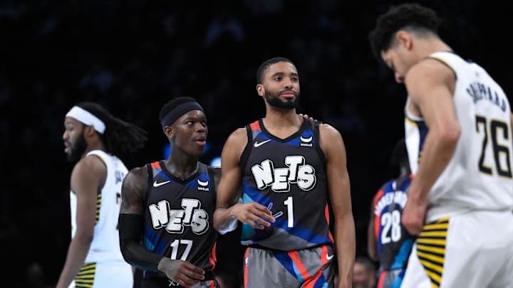 Apr 3, 2024; Brooklyn, New York, USA; Brooklyn Nets guard Dennis Schroder (17) and Brooklyn Nets forward Mikal Bridges (1) during the third quarter against the Indiana Pacers at Barclays Center. Mandatory Credit: John Jones-USA TODAY Sports