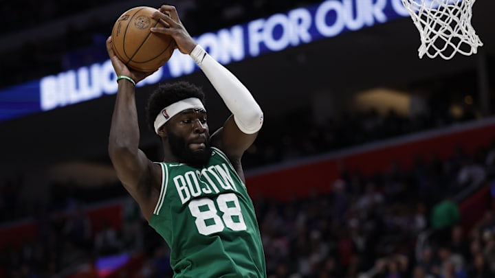 Jan 19, 2026; Detroit, Michigan, USA;  Boston Celtics center Neemias Queta (88) rebounds the ball in the second half against the Detroit Pistons at Little Caesars Arena. Mandatory Credit: Rick Osentoski-Imagn Images