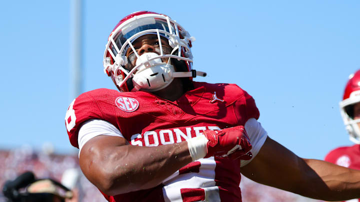 Oklahoma running back Taylor Tatum celebrates after scoring a touchdown against Tulane.