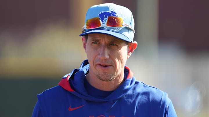 Feb 10, 2025; Mesa, AZ, USA; Chicago Cubs manager Craig Counsell (11) watches players warm up during spring training camp