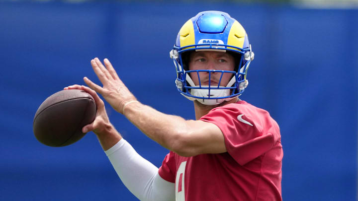 Jun 3, 2025; Woodland Hills, CA, USA; Los Angeles Rams quarterback Matthew Stafford (9) throws the ball during organized team activities at Rams Practice Facility. Mandatory Credit: Kirby Lee-Imagn Images