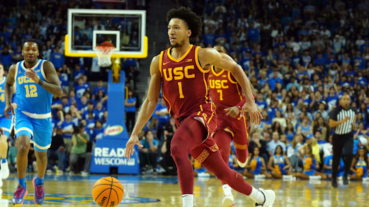 Mar 8, 2025; Los Angeles, California, USA; Southern California Trojans guard Desmond Claude (1) dribbles against the UCLA Bruins in the first half at Pauley Pavilion presented by Wescom. Mandatory Credit: Kirby Lee-Imagn Images Mar 8, 2025; Los Angeles, California, USA; Southern California Trojans guard Desmond Claude (1) dribbles against the UCLA Bruins in the first half at Pauley Pavilion presented by Wescom. Mandatory Credit: Kirby Lee-Imagn Images