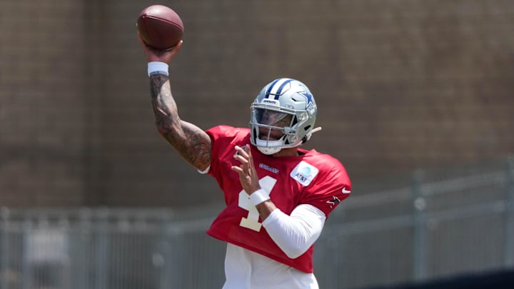 Dallas Cowboys quarterback Dak Prescott throws the ball at training camp at the River Ridge Fields. 