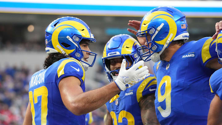 Dec 8, 2024; Inglewood, California, USA; Los Angeles Rams wide receiver Puka Nacua (17) celebrates with quarterback Matthew Stafford (9) and running back Kyren Williams (23) after scoring on a 4-yard touchdown run in the second quarter against the Buffalo Bills at SoFi Stadium. Mandatory Credit: Kirby Lee-Imagn Images Dec 8, 2024; Inglewood, California, USA; Los Angeles Rams wide receiver Puka Nacua (17) celebrates with quarterback Matthew Stafford (9) and running back Kyren Williams (23) after scoring on a 4-yard touchdown run in the second quarter against the Buffalo Bills at SoFi Stadium. Mandatory Credit: Kirby Lee-Imagn Images