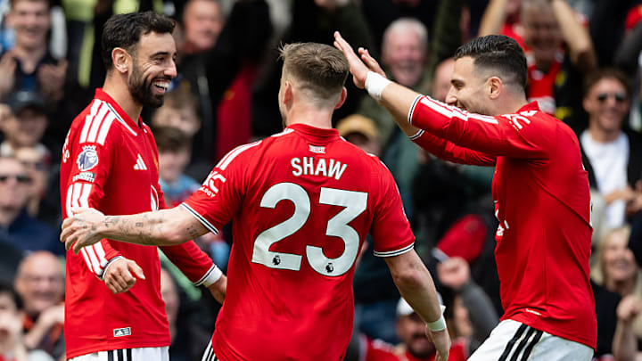 Teammates flocked to Bruno Fernandes as he hit the milestone.