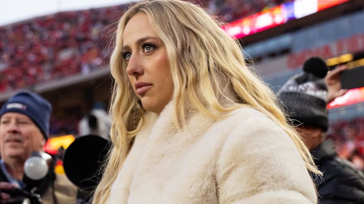 Brittany Mahomes on the sidelines before the AFC Championship game against the Buffalo Bills at GEHA Field at Arrowhead Stadium.