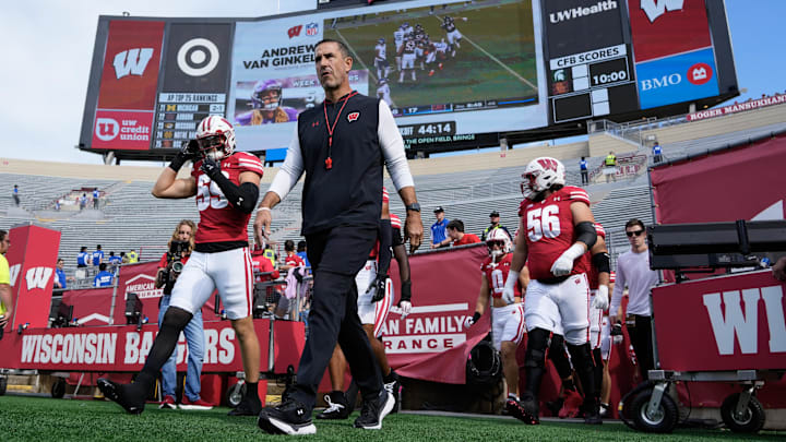 Sep 20, 2025; Madison, Wisconsin, USA;  Wisconsin Badgers head coach Luke Fickell walks onto the field prior to the game against the Maryland Terrapins at Camp Randall Stadium. 