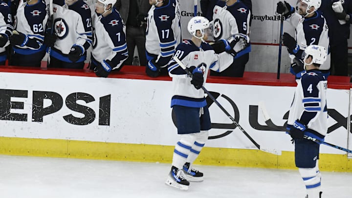 Apr 12, 2025; Chicago, Illinois, USA;  Winnipeg Jets left wing Kyle Connor (81) celebrates with teammates after scoring s goal against the Chicago Blackhawks during the second period at United Center. Mandatory Credit: Matt Marton-Imagn Images